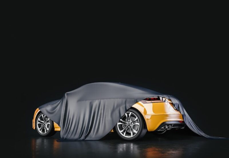 [freepicdownloader.com]-yellow-cars-that-are-covered-fabric-normal
